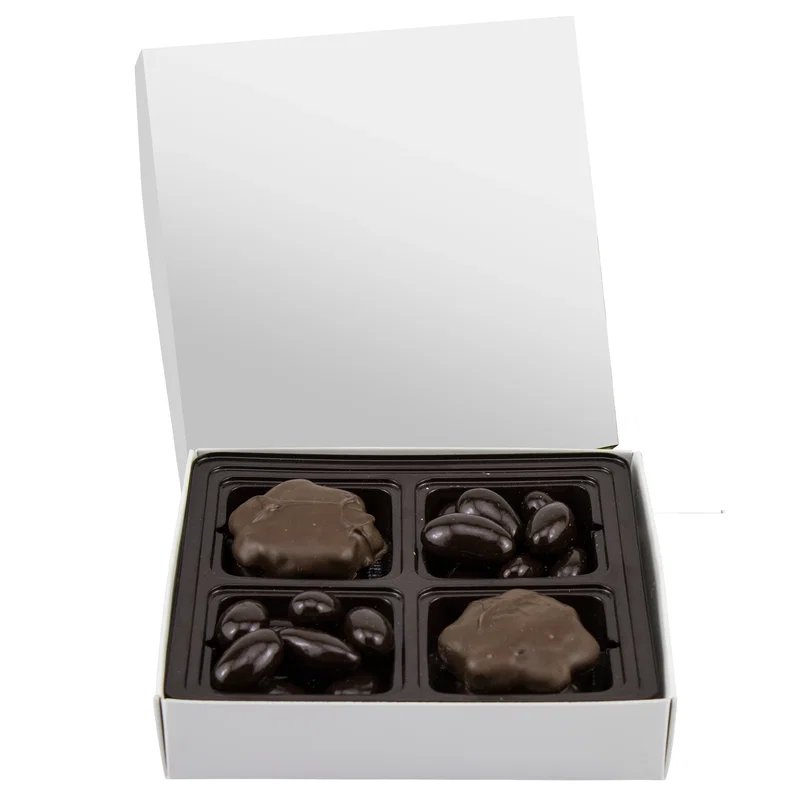 Chocolate assortment shown beside its white packaging