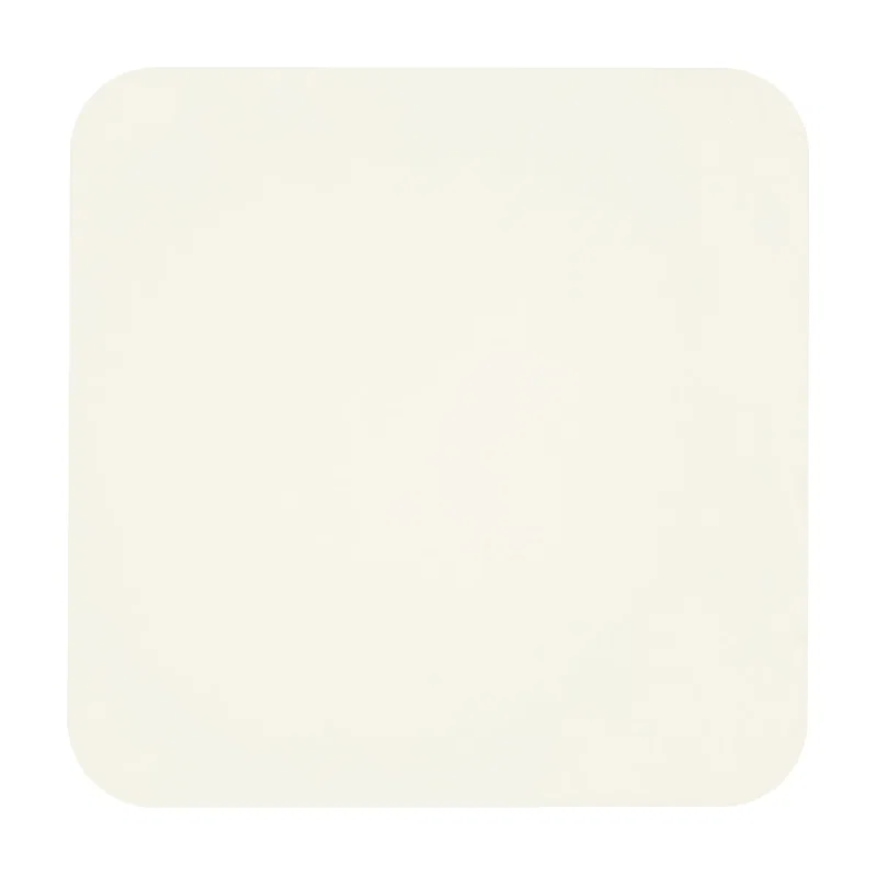 Glass set down on the blank paper mat
