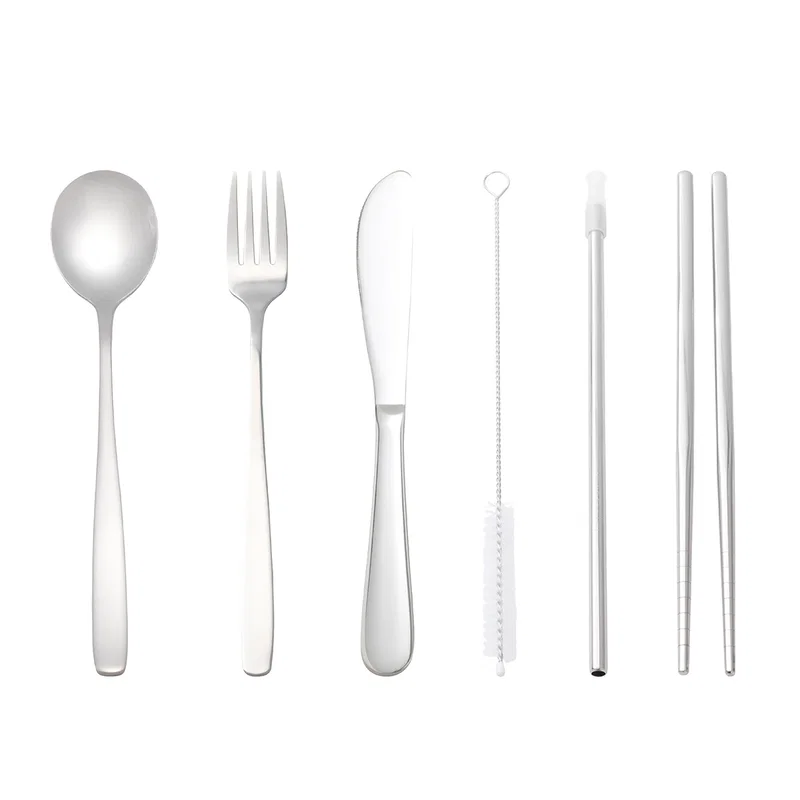 Stainless Steel Cutlery Set pieces including fork, knife, spoon, chopsticks, and reusable straw laid out individually