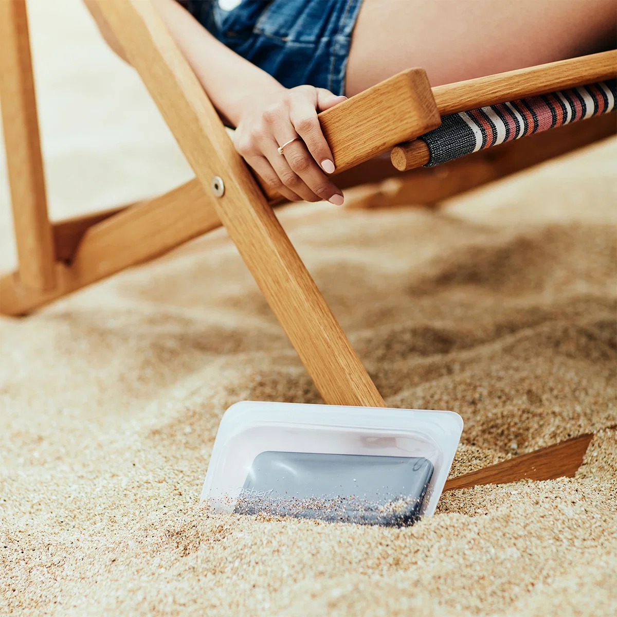 Stasher® Snack Bag held in hand