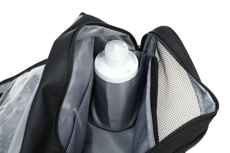 Close-up of the custom Steward Soft Leatherette Toiletry Bag's logo imprint area