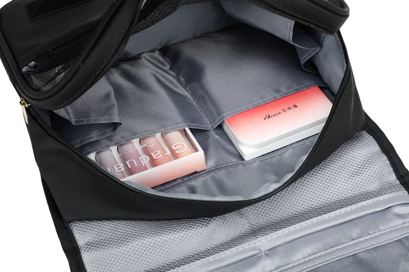 Open view of the branded Steward Soft Leatherette Toiletry Bag showing the interior compartments