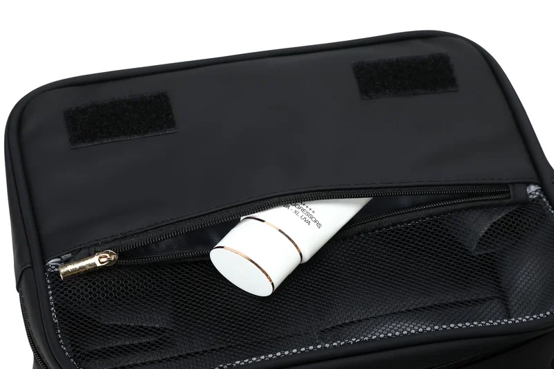 Promotional Steward Soft Leatherette Toiletry Bag packed for travel, branded toiletry bag lifestyle shot
