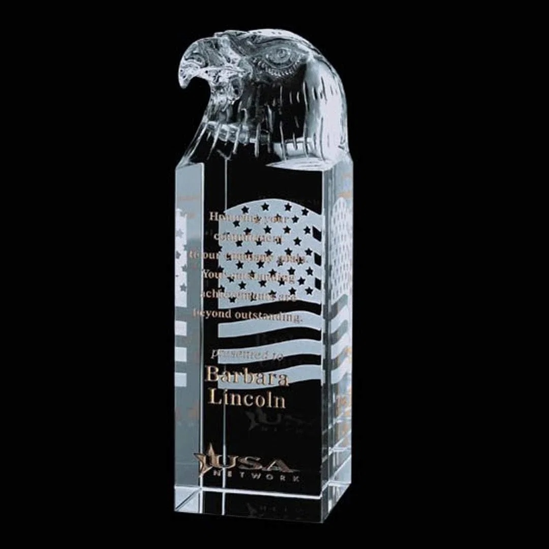 Custom Optical Crystal Column Award Topped With an Eagle Head for corporate award ceremonies