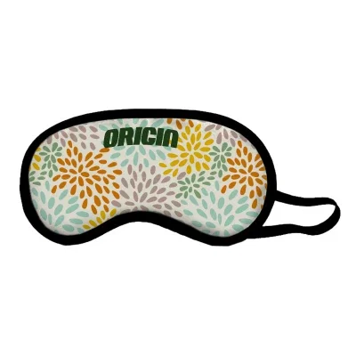 Sleep eye mask laid flat with the strap extended