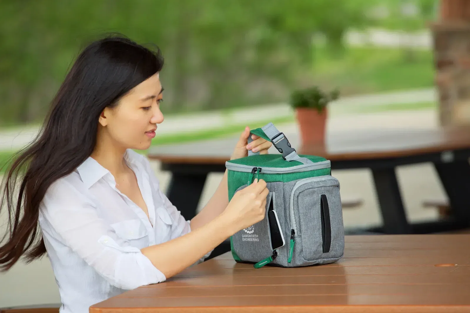 Custom Summit cooler bag side profile showing built-in napkin dispenser slot