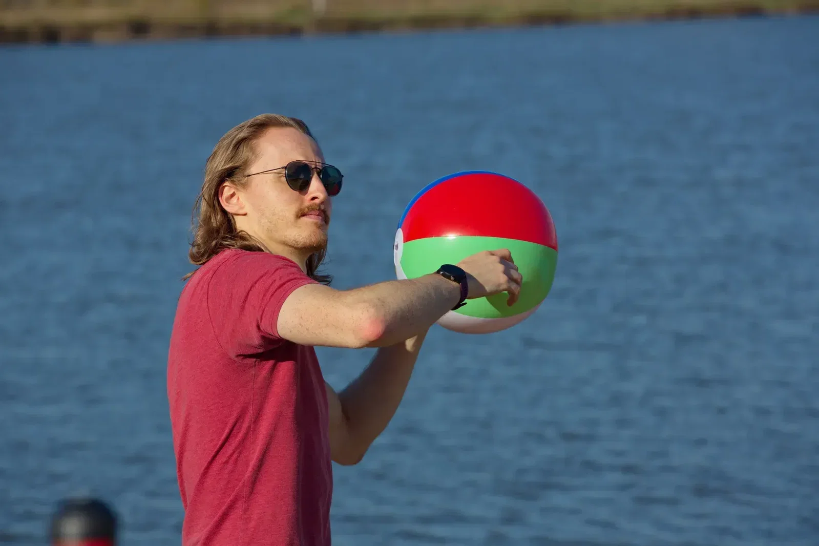 Custom Sunburst beach ball showing colorful panels and imprint area, branded promotional ball
