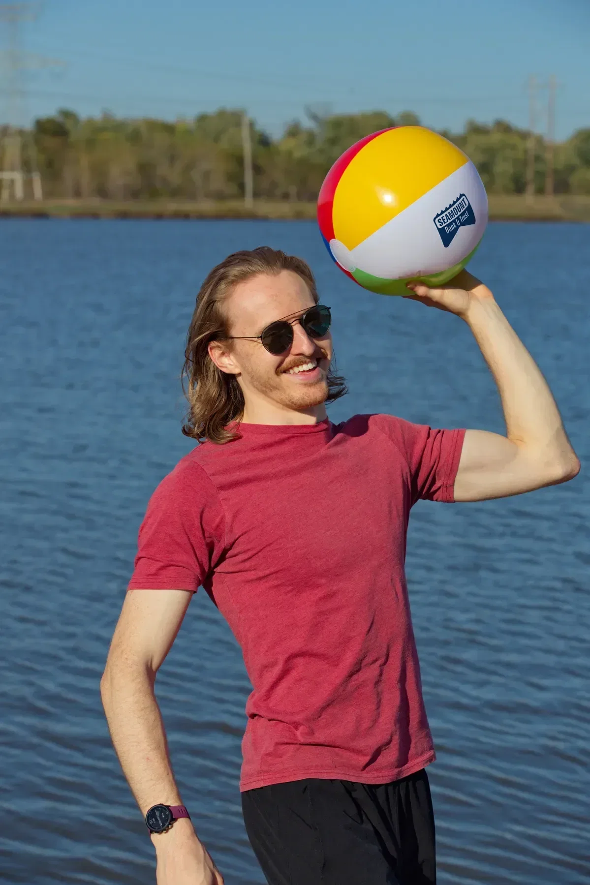 Sunburst 16" Inflatable Beach Ball held in hand