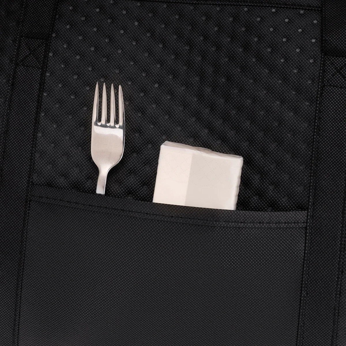 Close-up of the custom Sundial Non-Woven Cooler Bag's logo imprint area