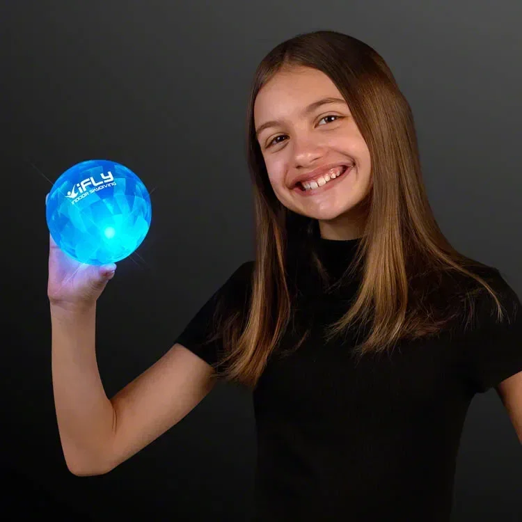 Super Sized Blue Air Bounce Balls with LEDs held in hand