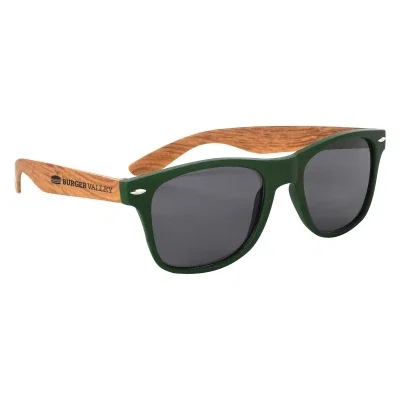 Pair of shades laid flat on a plain background