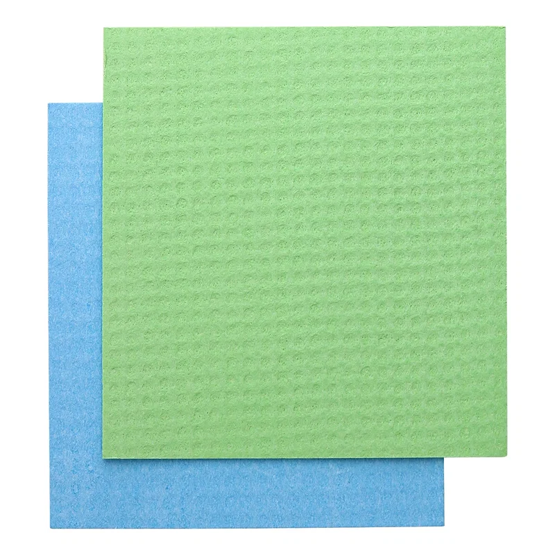 Overhead flat-lay of the Swedish All-Natural Dishcloths' waffle-textured blue and green sheets