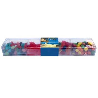 Long clear box holding a medley of sweets, over twelve inches deep