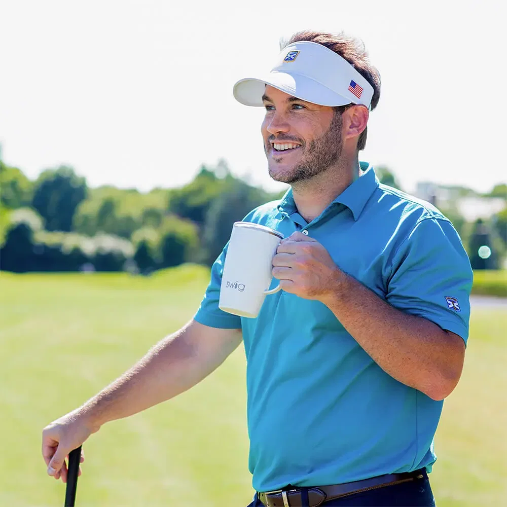 Swig 18oz Golf Partee Travel Mug held in hand
