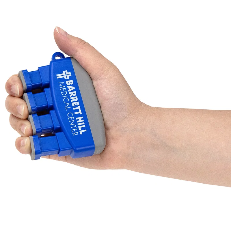 Talon Finger Exerciser resting on a desk, angled view