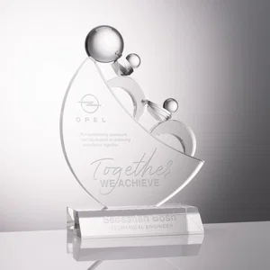 Optical Crystal Award with Two Sculpted Figures Moving a Boulder