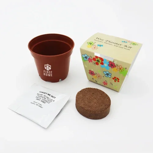 Wee planter seed kit angled view, terra cotta colored promotional grow kit