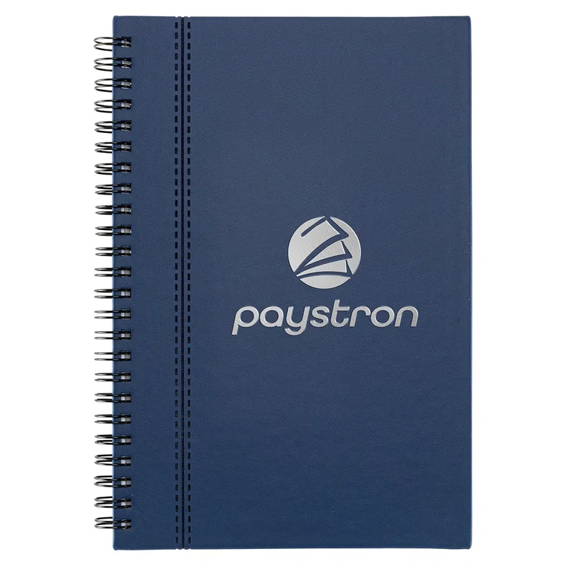 The Ambassador Executive Spiral Journal on a desk, promotional journal lifestyle shot