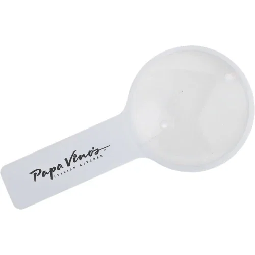 Detective magnifying glass shown at angle highlighting handle and round Fresnel lens