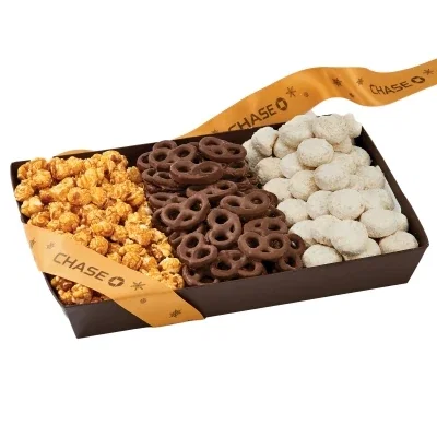 Brown gift tray filled with popcorn, pretzels and cookies