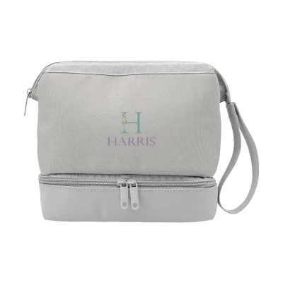 Zippered toiletry bag with a drop-bottom compartment, shown closed