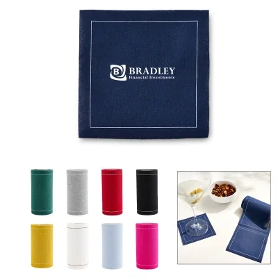 Green napkins rolled and tied for display