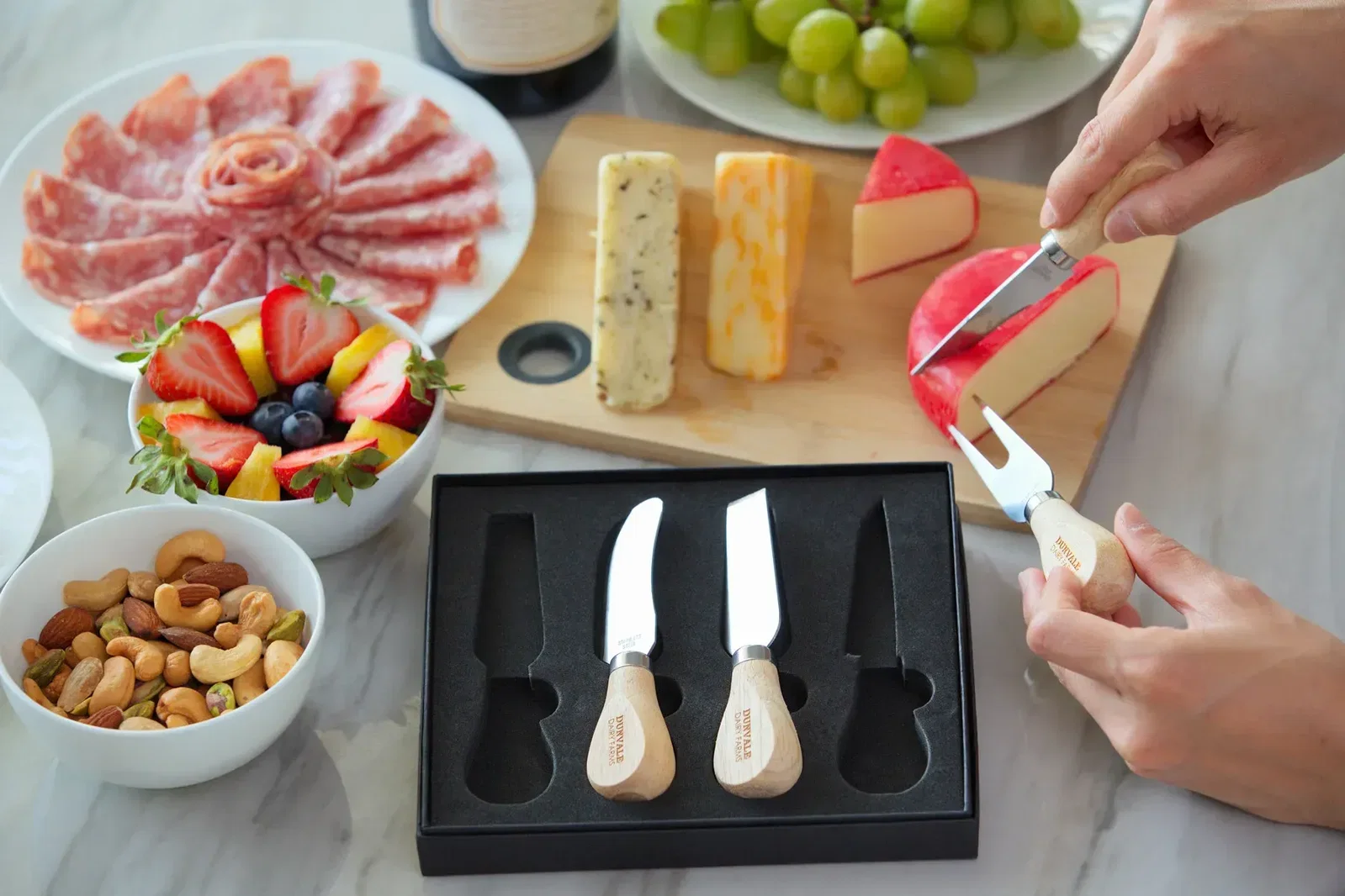 Tomme 4-Piece Cheese Knife Set in use