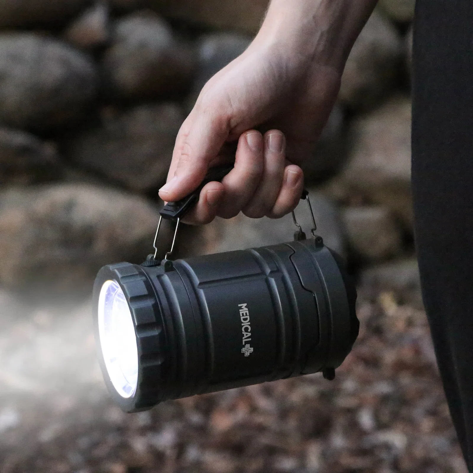Torcher 2 In 1 Pop Up Lantern With Handle held in hand
