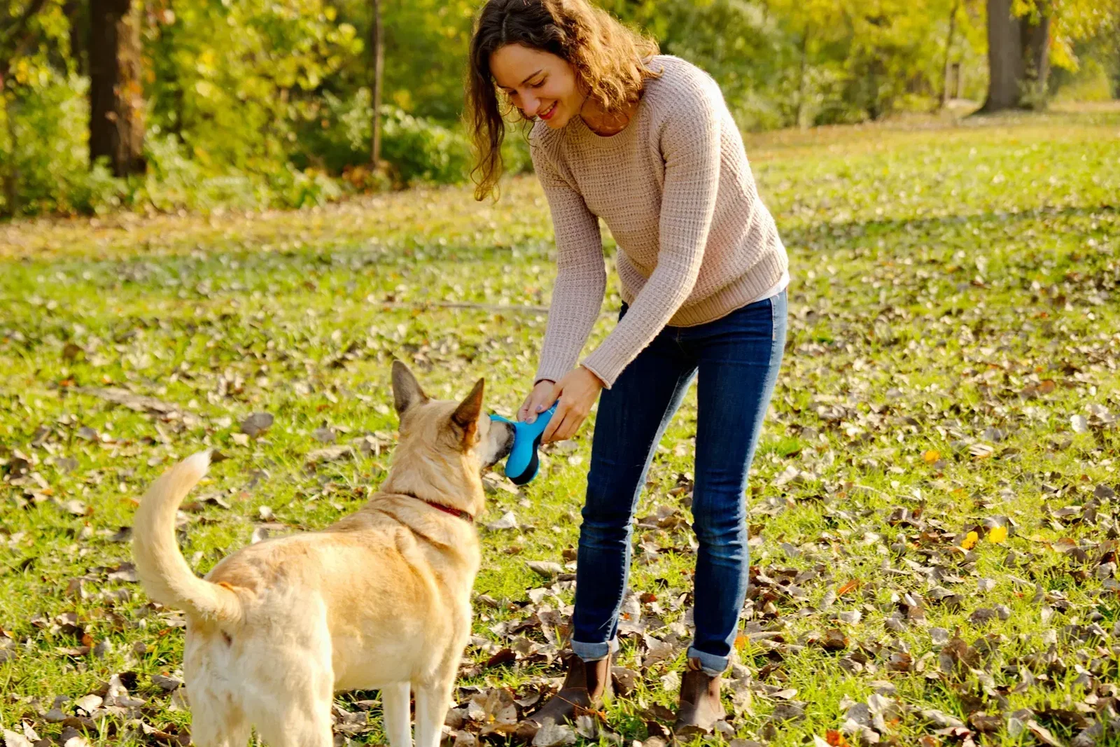 Toss-N-Float Squeaker Dog Toy in use