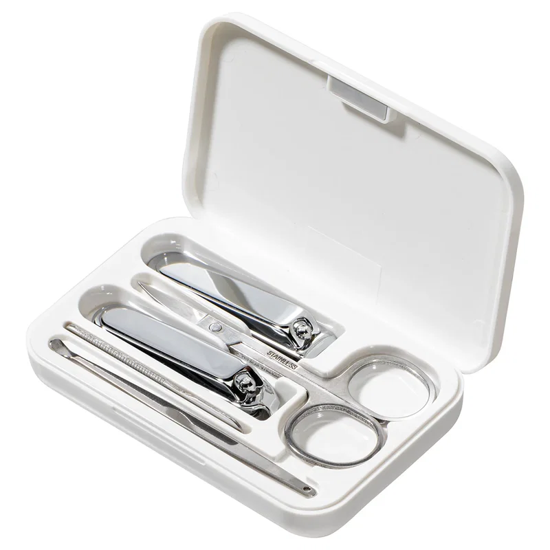 Branded TravelMate Manicure Kit unzipped to show the grooming tools inside