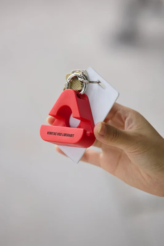 Angled view of the Triangle Phone Stand highlighting its triangular profile