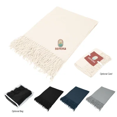 Recycled throw blanket finished with tassels along the edge