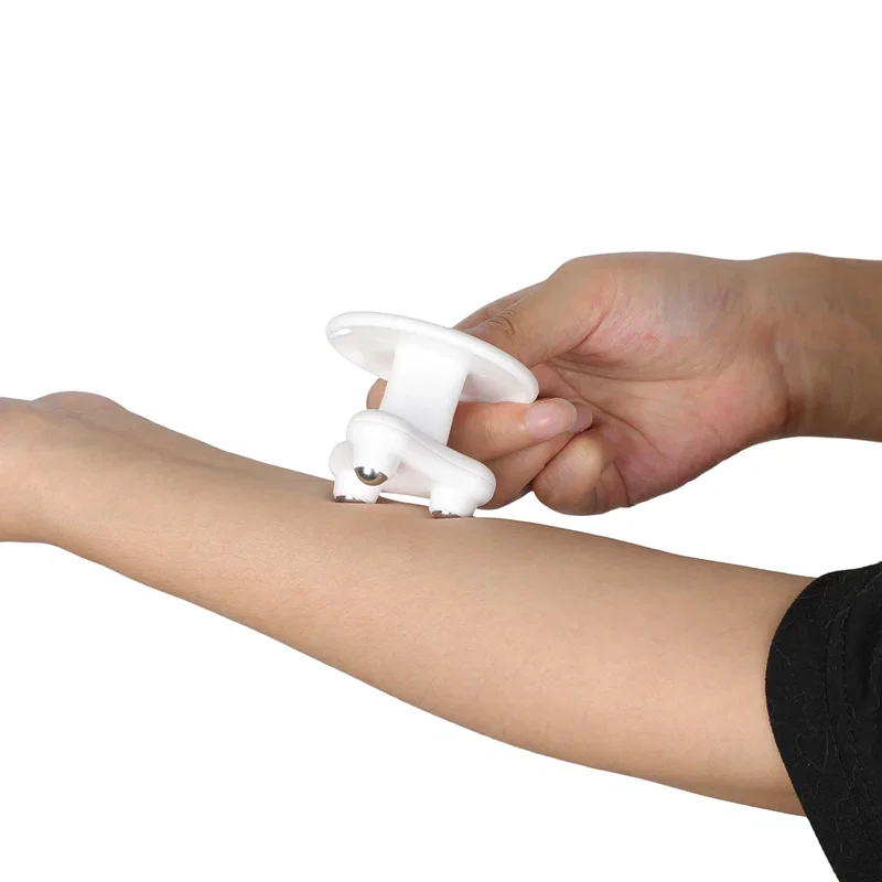 Bottom view of the custom Triton Roller Massager showing the roller base