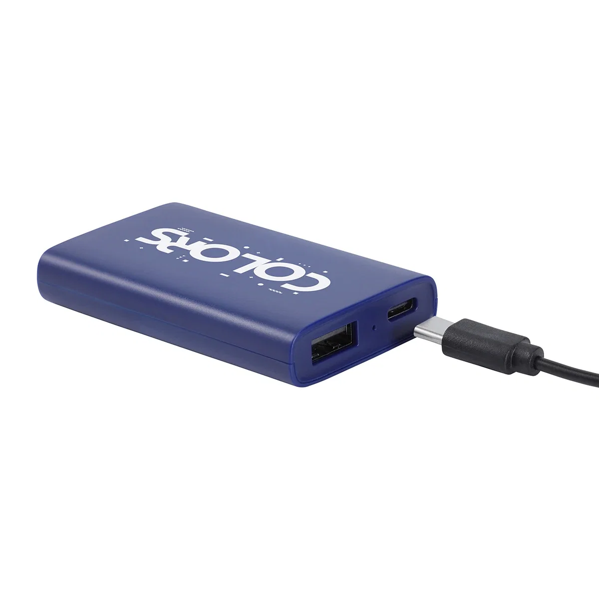 Triumph Power Bank in use, charging a smartphone via USB cable