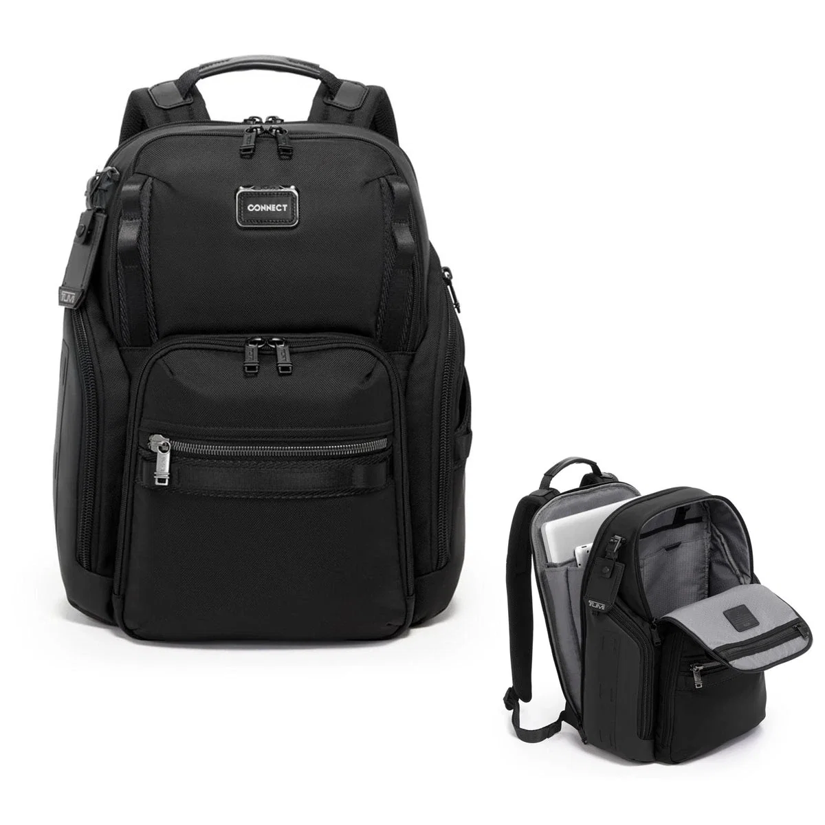 Black backpack standing upright with padded straps and top handle