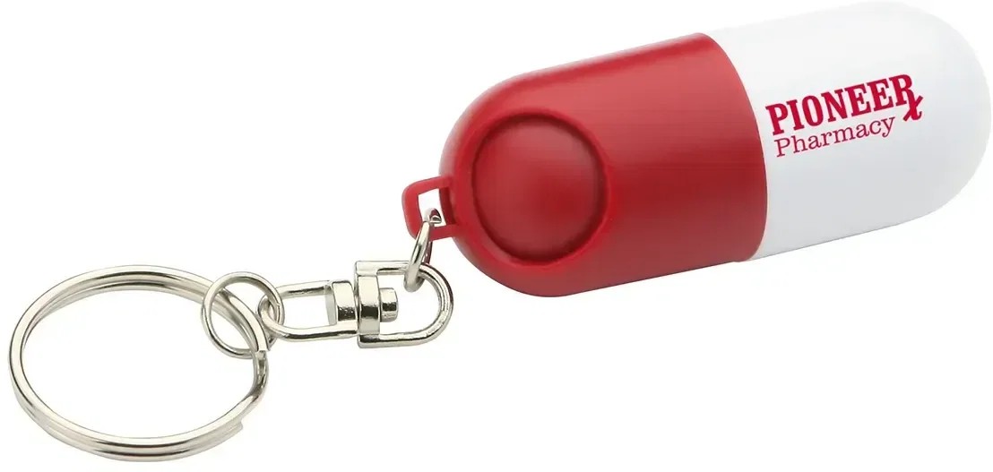 Branded Twist-A-Pill keychain pill holder close-up, imprint area for a logo