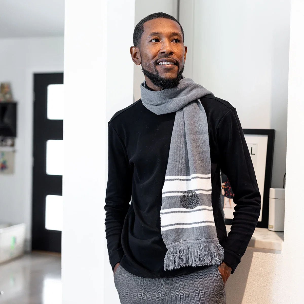 Two-Tone Knit Scarf With Fringe being worn