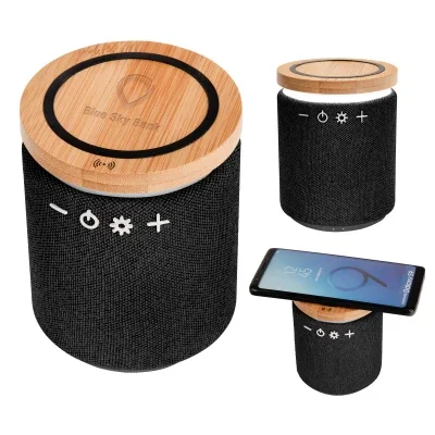 Compact desk speaker seen from a raised angle