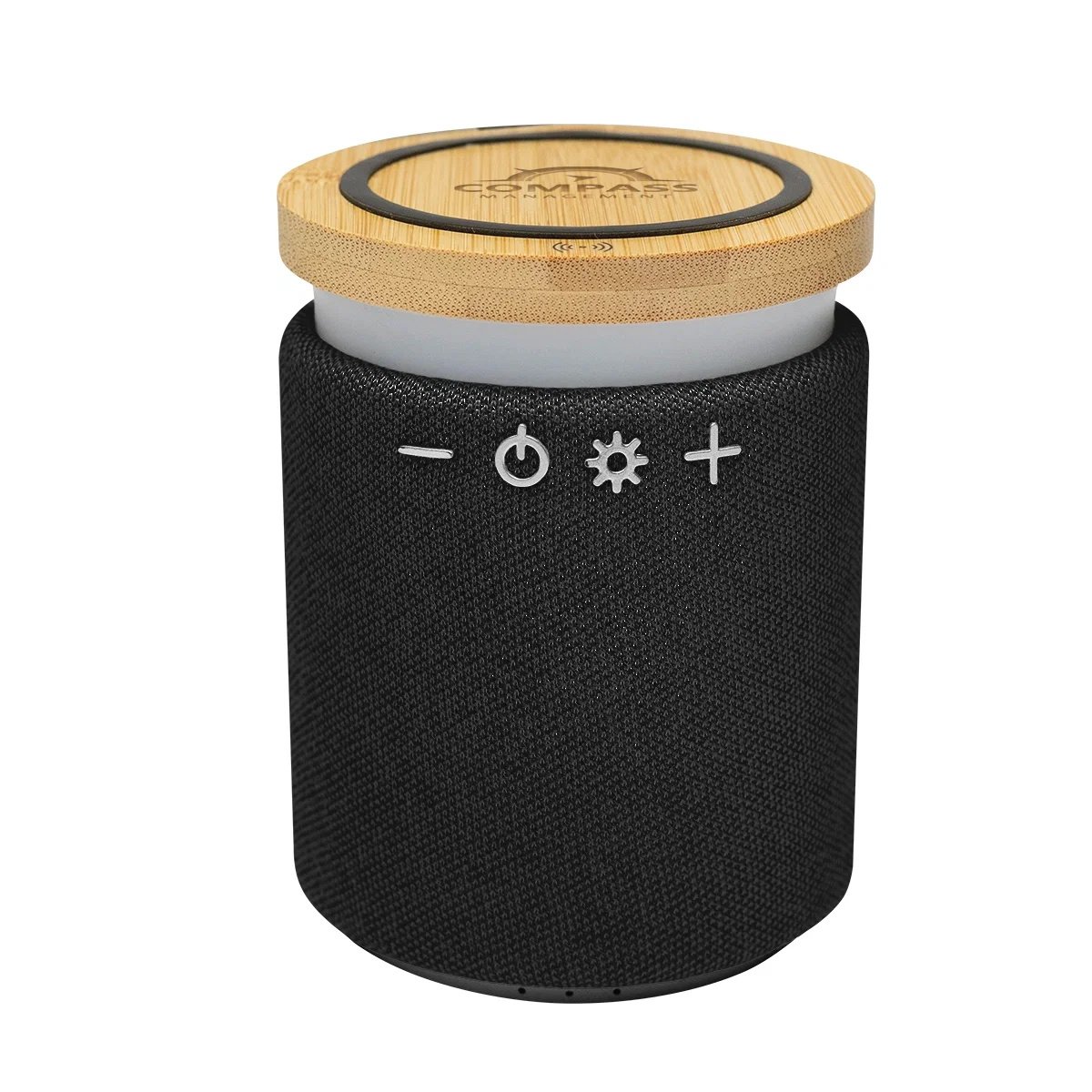 Wireless charging pad and speaker combined in one desktop unit