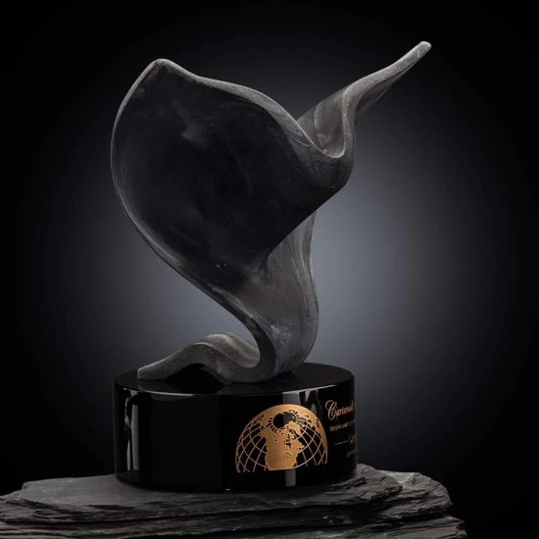 Custom Stonecast Cresting Wave Sculpture Award on Crystal Base, marble for corporate award ceremonies