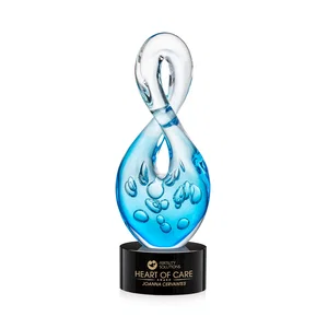 Blue Glass Award With a Twisting Infinity-Loop Silhouette