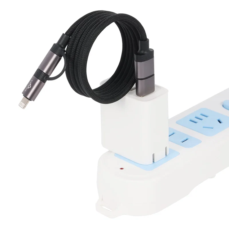 Vector 4-in-1 Charging Cable stretched out to show its full 39-inch length on a flat surface
