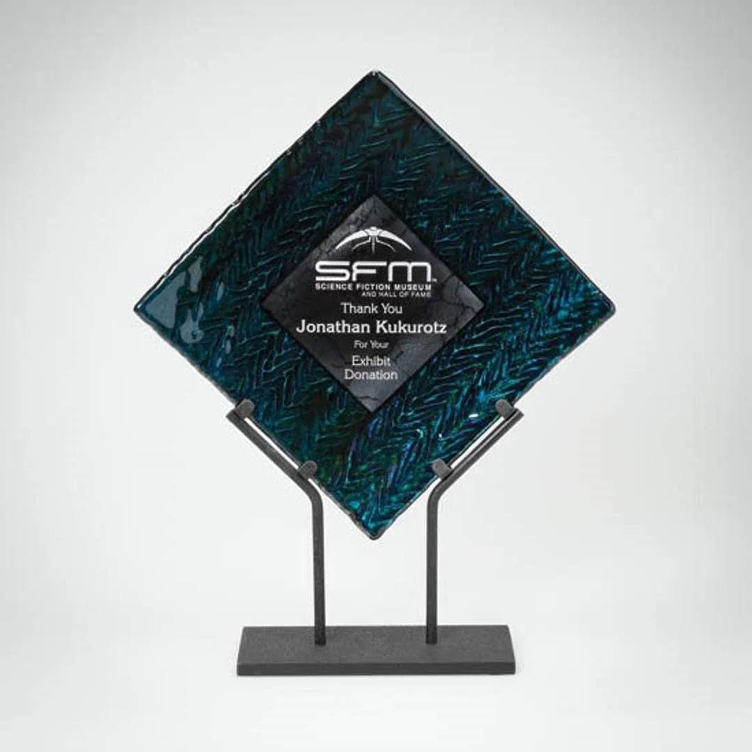 Custom Glass Herringbone Plate Award on Black Steel Stand for corporate award ceremonies