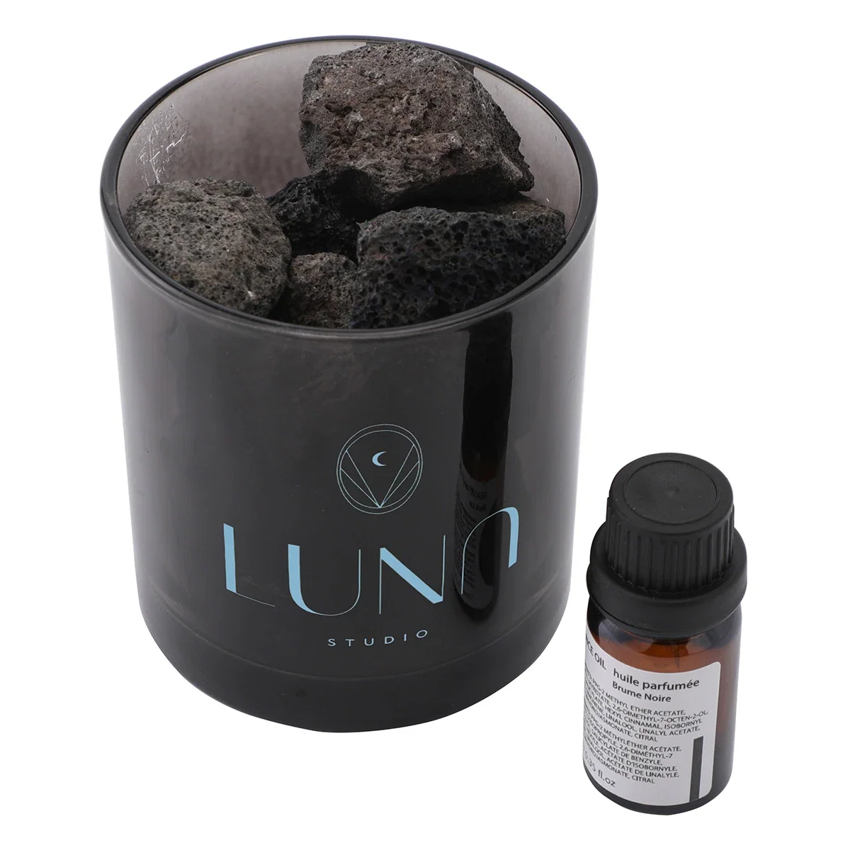 Branded Volcanic Rock Diffuser on a nightstand, lifestyle in-use shot