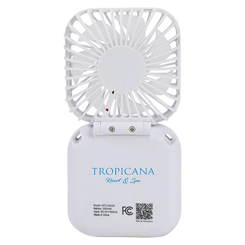 Branded folding personal fan standing on a desk