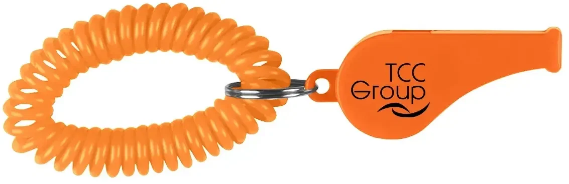 Whistle attached to a stretch coil wristband shown on a plain surface