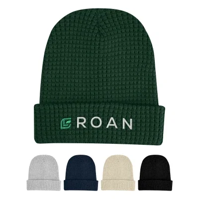 Black beanie displayed with its cuff folded up