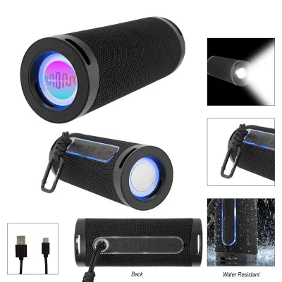 Barrel-shaped wireless speaker with a flashlight in the end