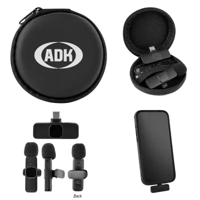 Wireless lavalier microphone resting beside its round black case