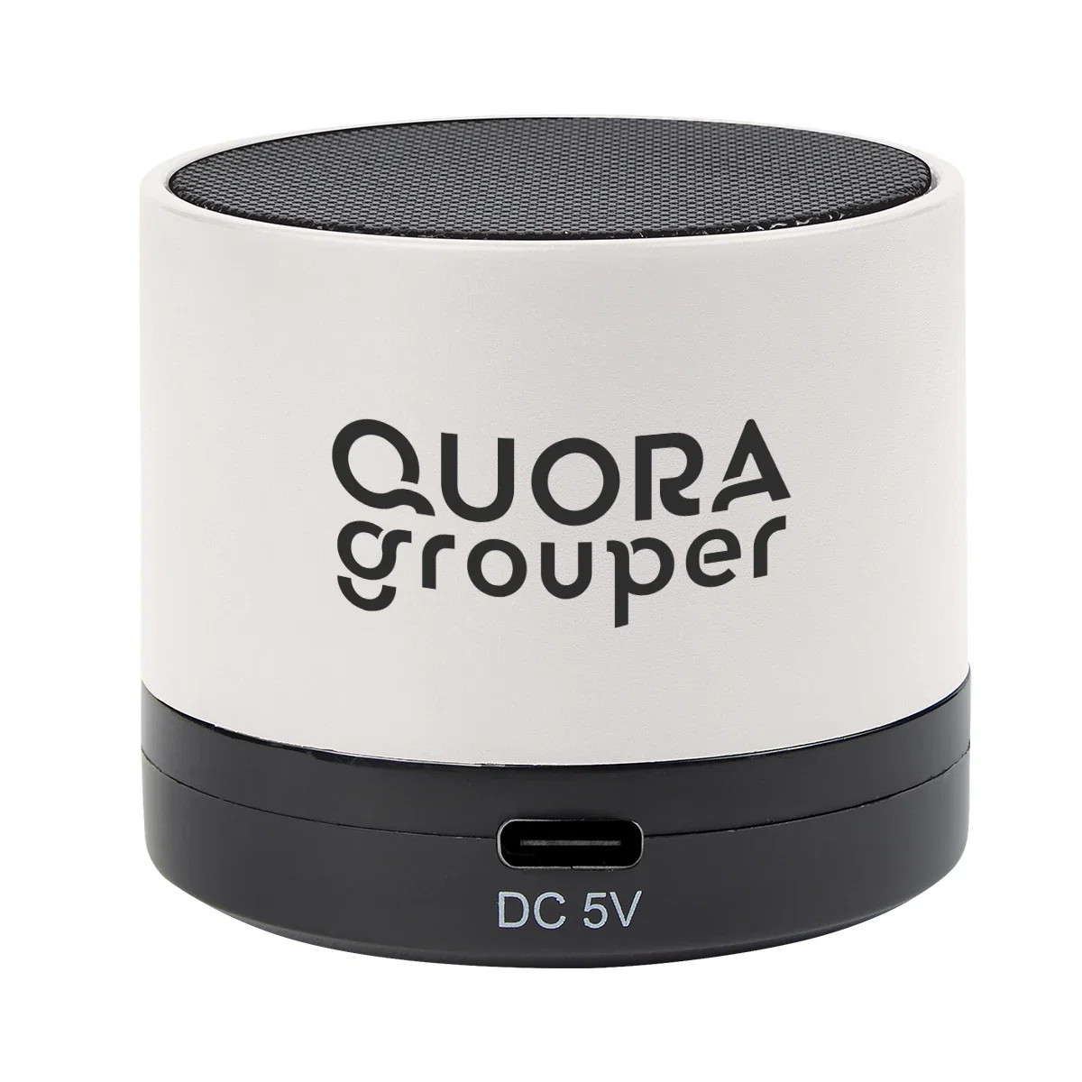 Mini cylinder speaker measuring about two inches across